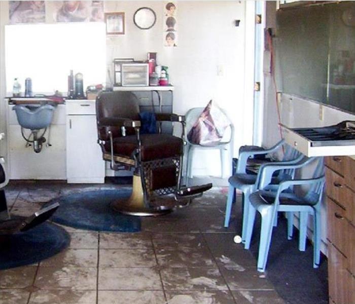 sewage on tiled floor of salon