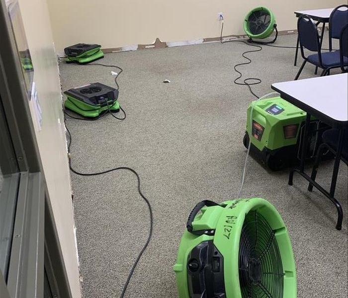 equipment green drying walls and carpet, folding tables